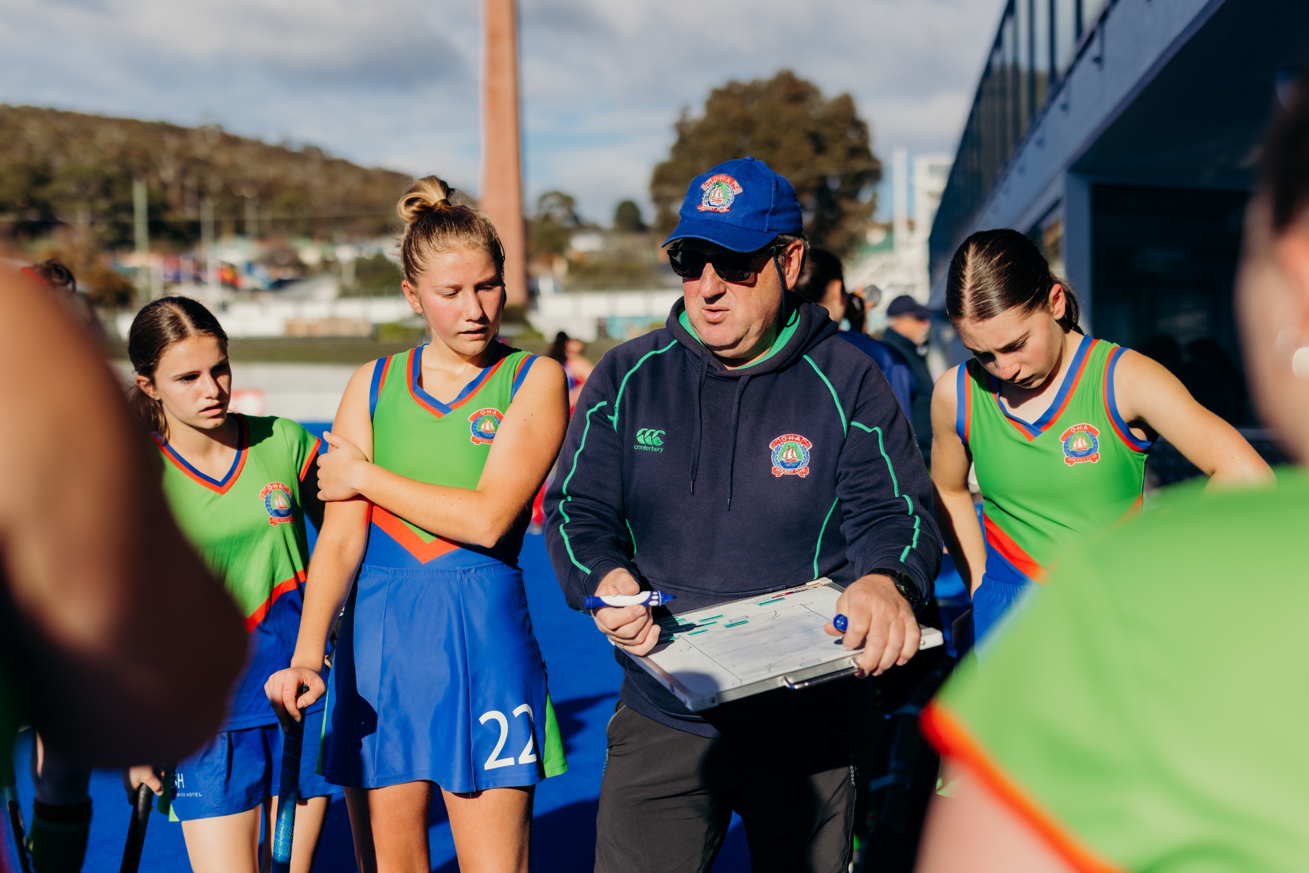coach with team players